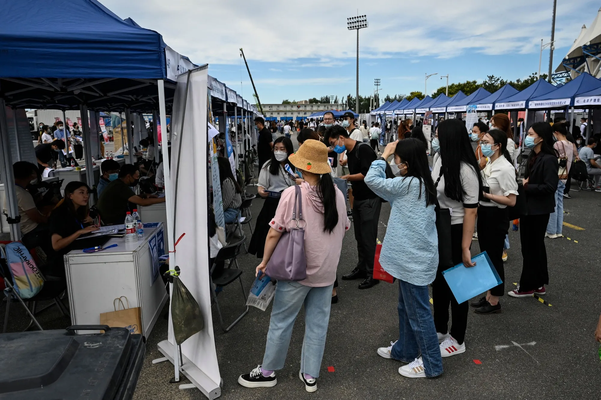 Youth attending a job fair in Beijing in August.&nbsp;
