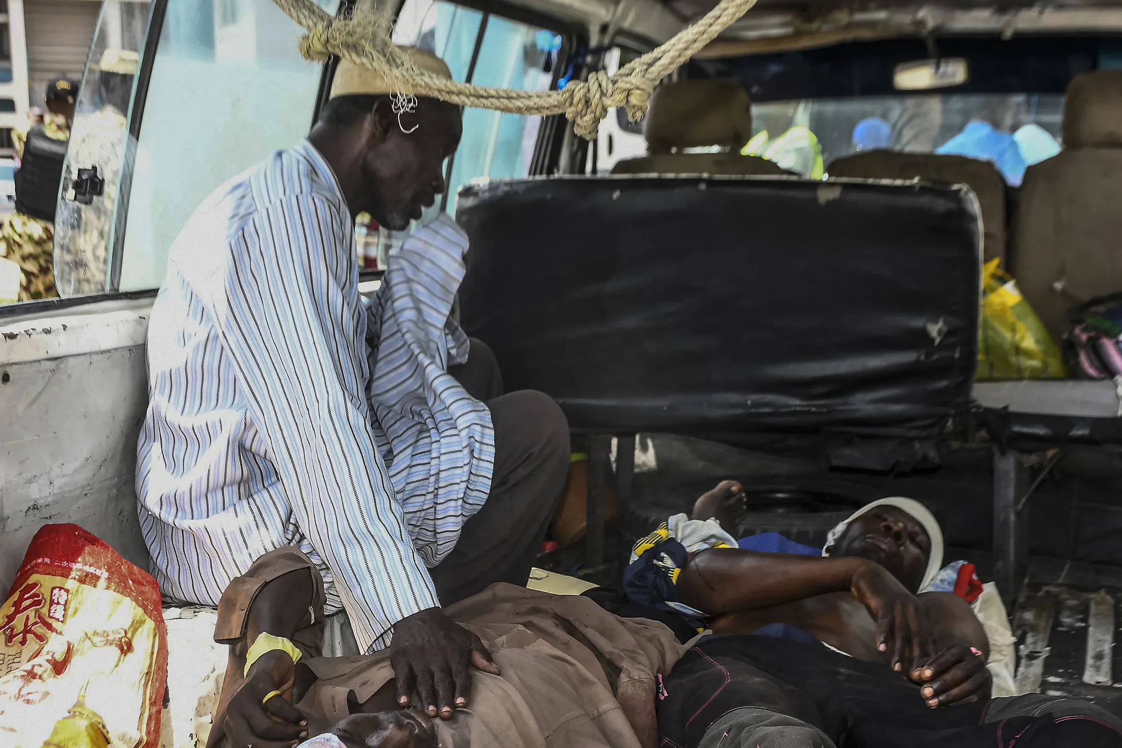 Injured residents lay in a van as they arrive for treatment after a wave of suicide attacks in the North East of Nigeria&nbsp;on June 29, 2024.