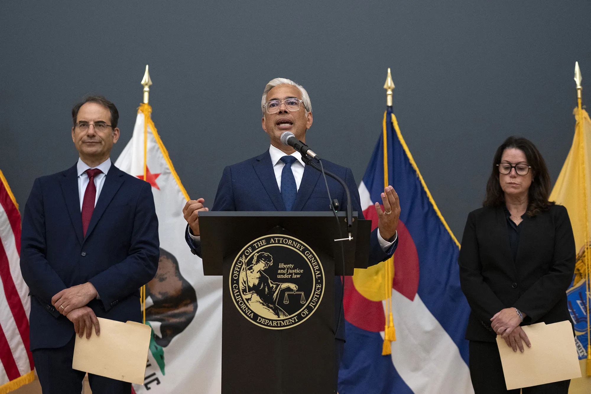 California Attorney General Rob Bonta, center, speaks alongside Colorado Attorney General Phil Weiser, left, and New Jersey Attorney General Jennifer Davenport during a press conference after opening arguments in the Meta trial over a lawsuit brought by US states about social media addiction at the Ronald V. Dellums Federal Building and United States Courthouse in Oakland, California, on Aug. 18.