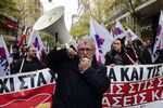 Members of the media take part in the 24hr general strike in Athens on Dec. 7.
