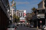 A 'mask up' billboard covers the front of a building&nbsp;in Cape Town on Aug. 19.