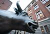 A bull statue stands outside Amsterdam Stock Exchange, operated by Euronext NV, in Amsterdam, Netherlands.