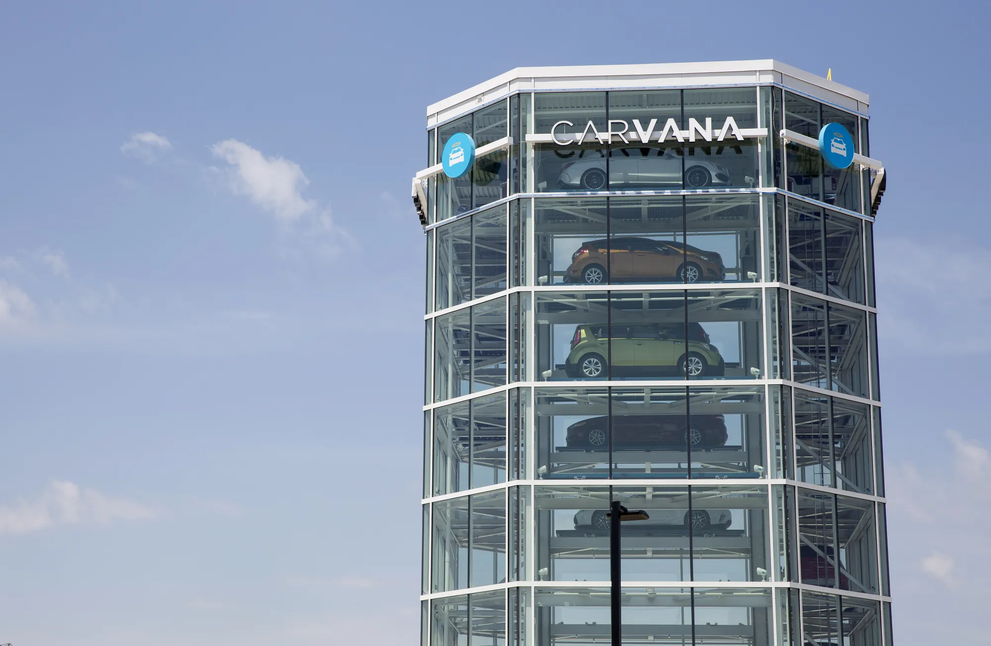 Vehicles sit inside the Carvana Co. car vending machine in Frisco, Texas.&nbsp;