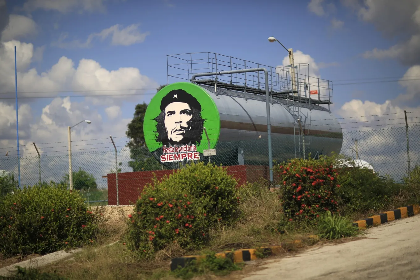 An oil tank of at an electrical facility is adorned with the face of revolutionary hero Che Guevara outside Santiago de Cuba.