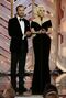 Presenters Tom Ford and Lady Gaga speak onstage during the 73rd Annual Golden Globe Awards at The Beverly Hilton Hotel on January 10, 2016 in Beverly Hills, California.
