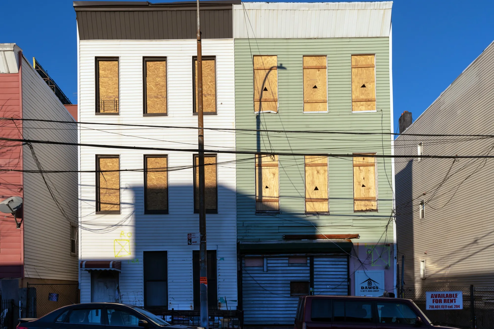 Boarded up residential buildings stand in the Port Morris neighborhood of the Bronx borough of New York.