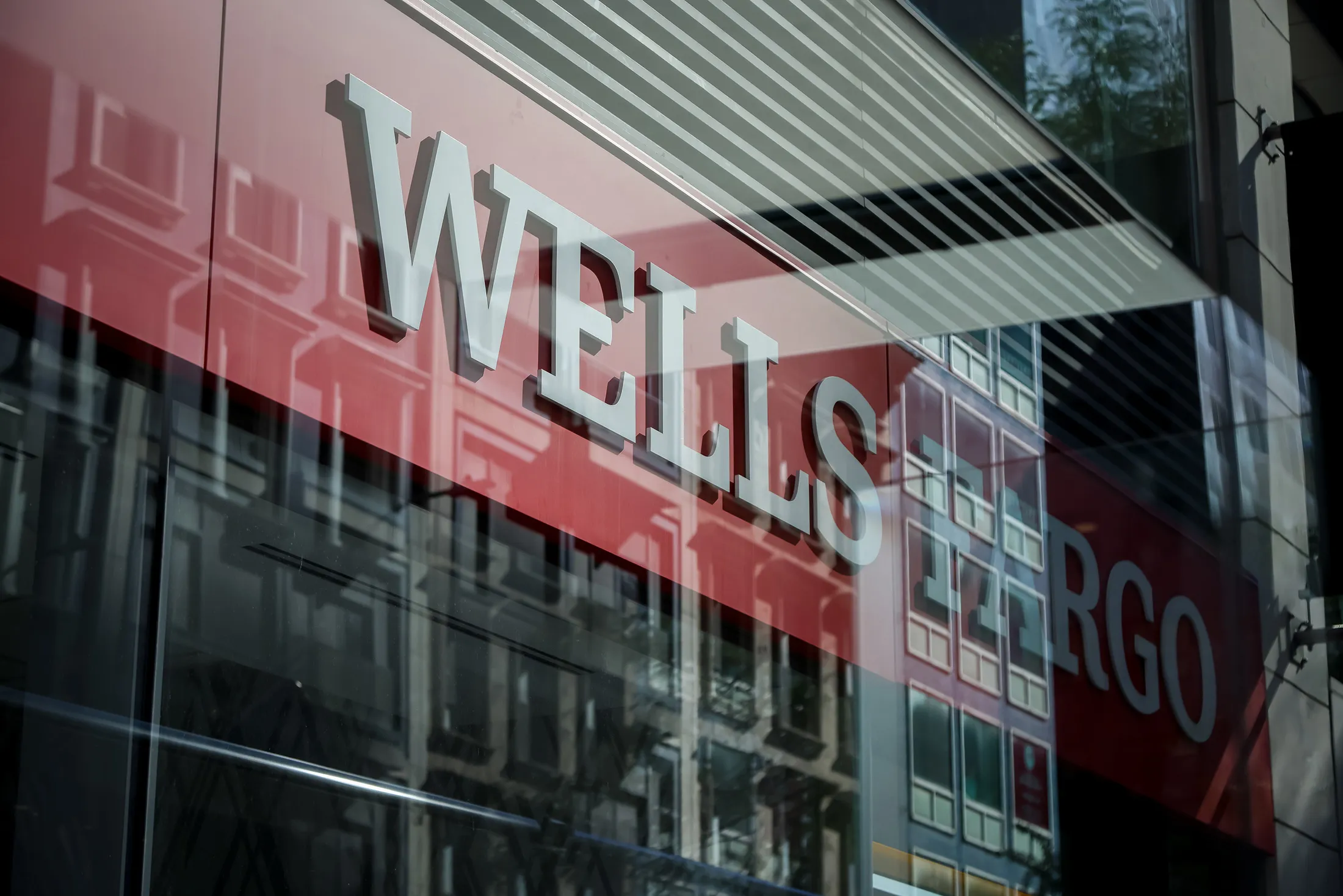 A Wells Fargo bank branch in New York, US, on Tuesday, Oct. 21, 2025. Wells Fargo & Co. CEO Charles Scharf said risks surrounding the rapid growth of private credit shouldn’t be painted with a broad brush and aren’t causing major systemic issues among banks.