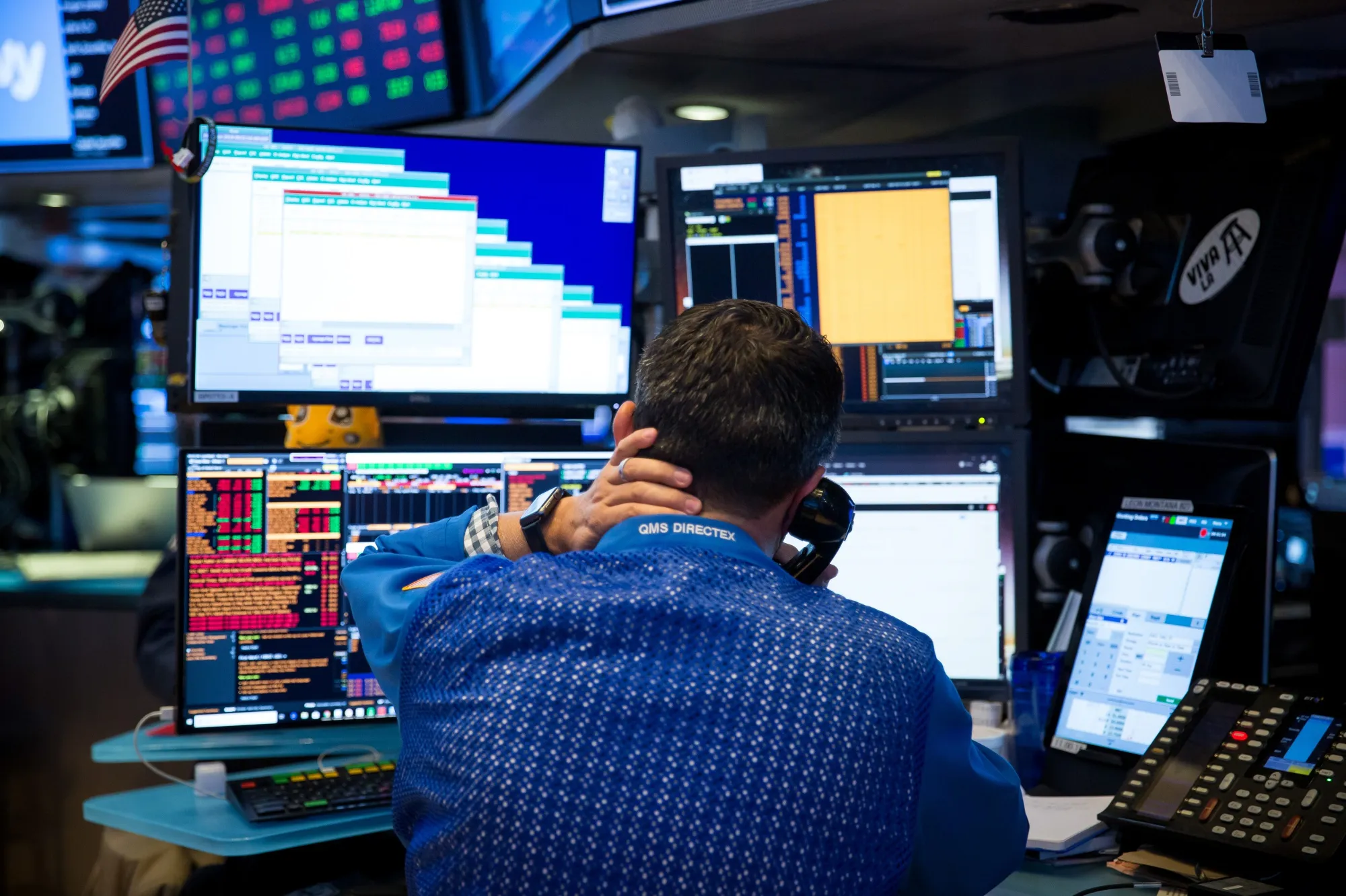 A trader works on the floor of the New York Stock Exchange.