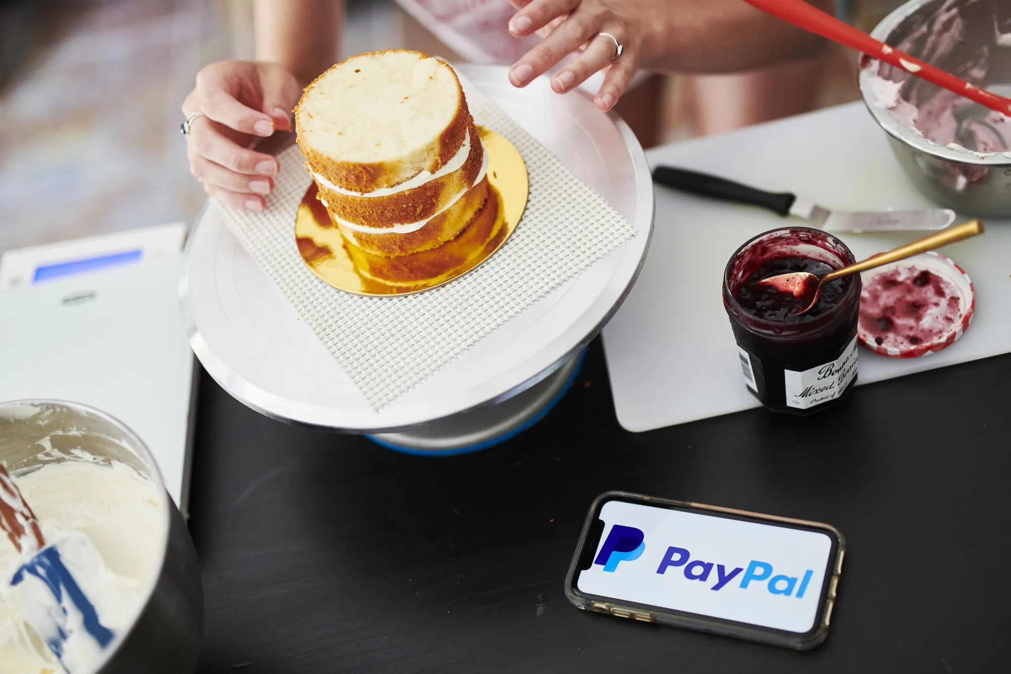 PayPal signage is displayed on an Apple&nbsp;iPhone.