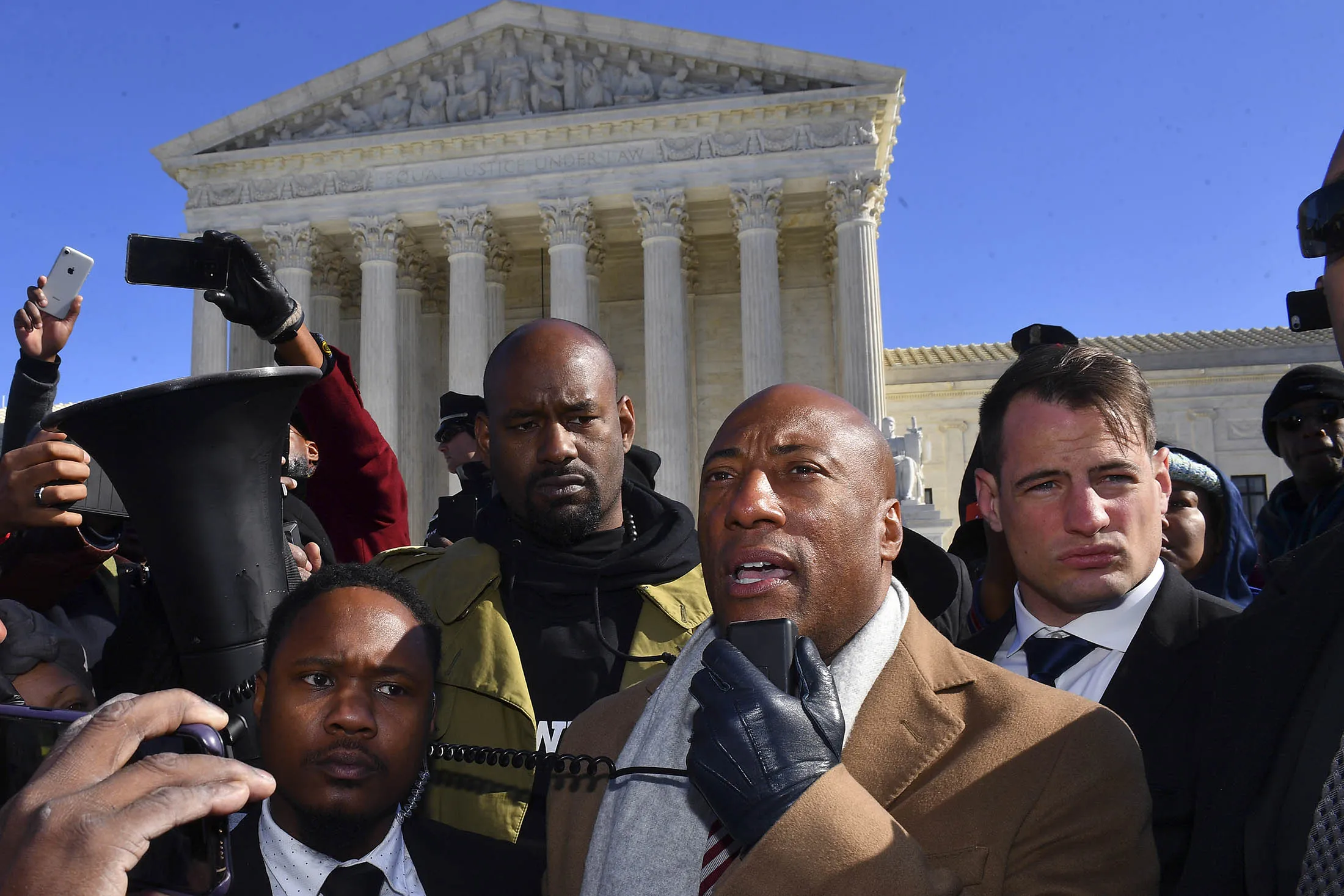 Byron Allen speaks outside the Supreme Court in 2019.