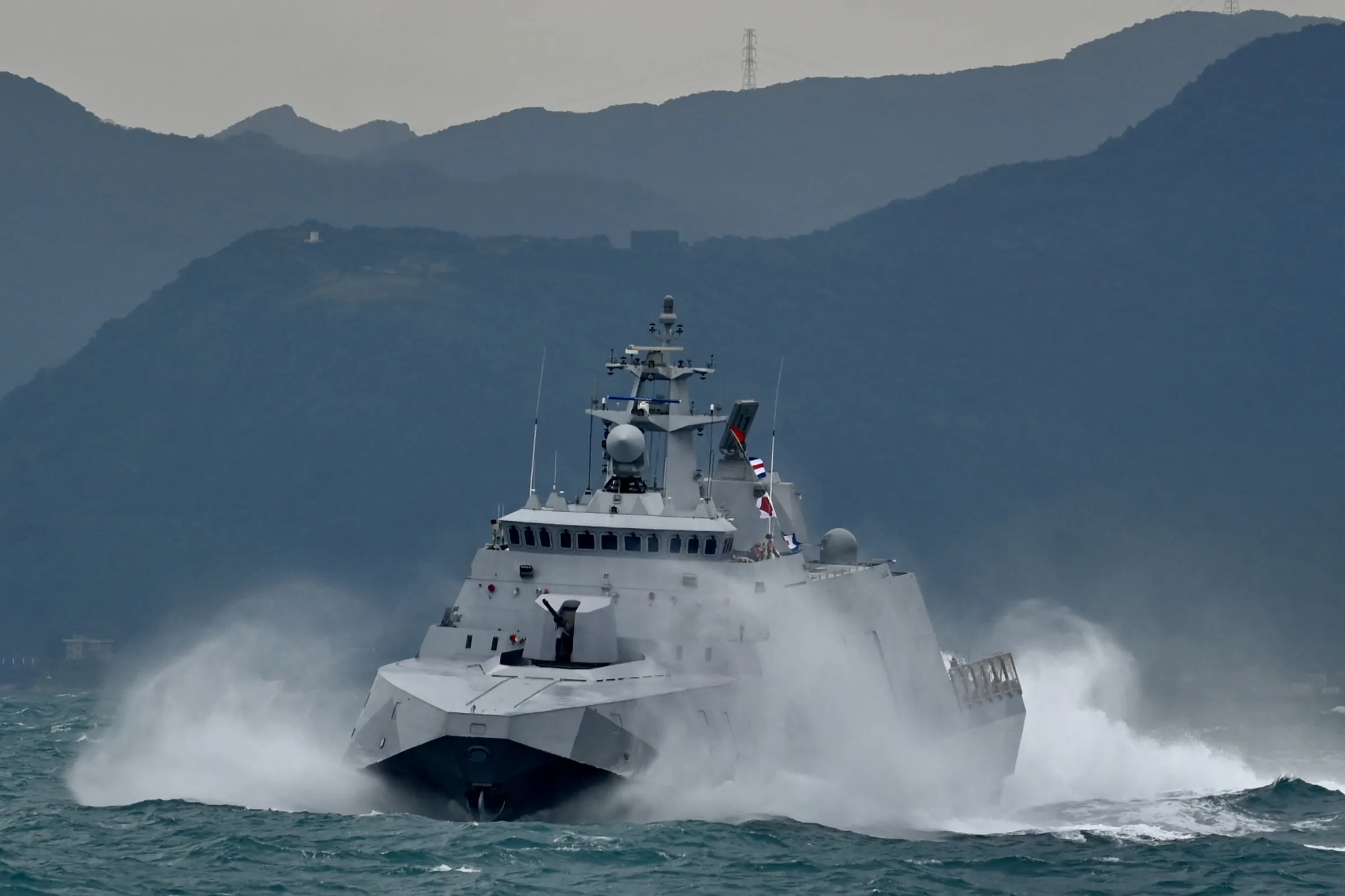 Taiwan's navy vessel demonstrate combat readiness during a drill in Jan. 2022.&nbsp;