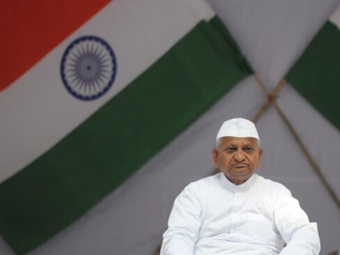 Singh Faces Protests by Campaigner Hazare on Graft Law