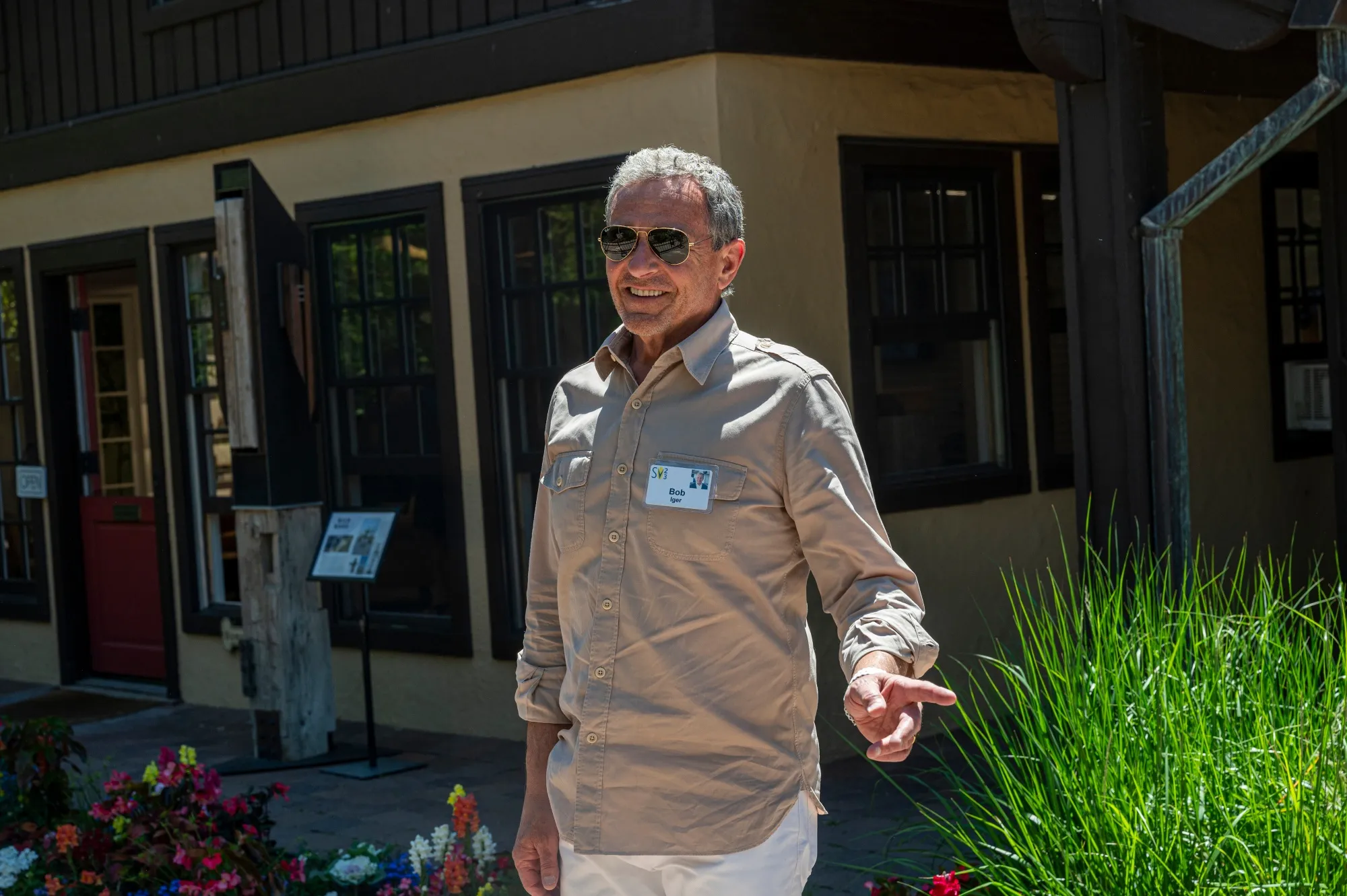 Bob Iger, chief executive officer of The Walt Disney Co., walks the grounds during the Allen & Co. Media and Technology Conference in Sun Valley, Idaho, US, on Friday, July 14, 2023. The summit is typically a hotbed for etching out mergers over handshakes, but could take on a much different tone this year against the backdrop of lackluster deal volume, inflation and higher interest rates.