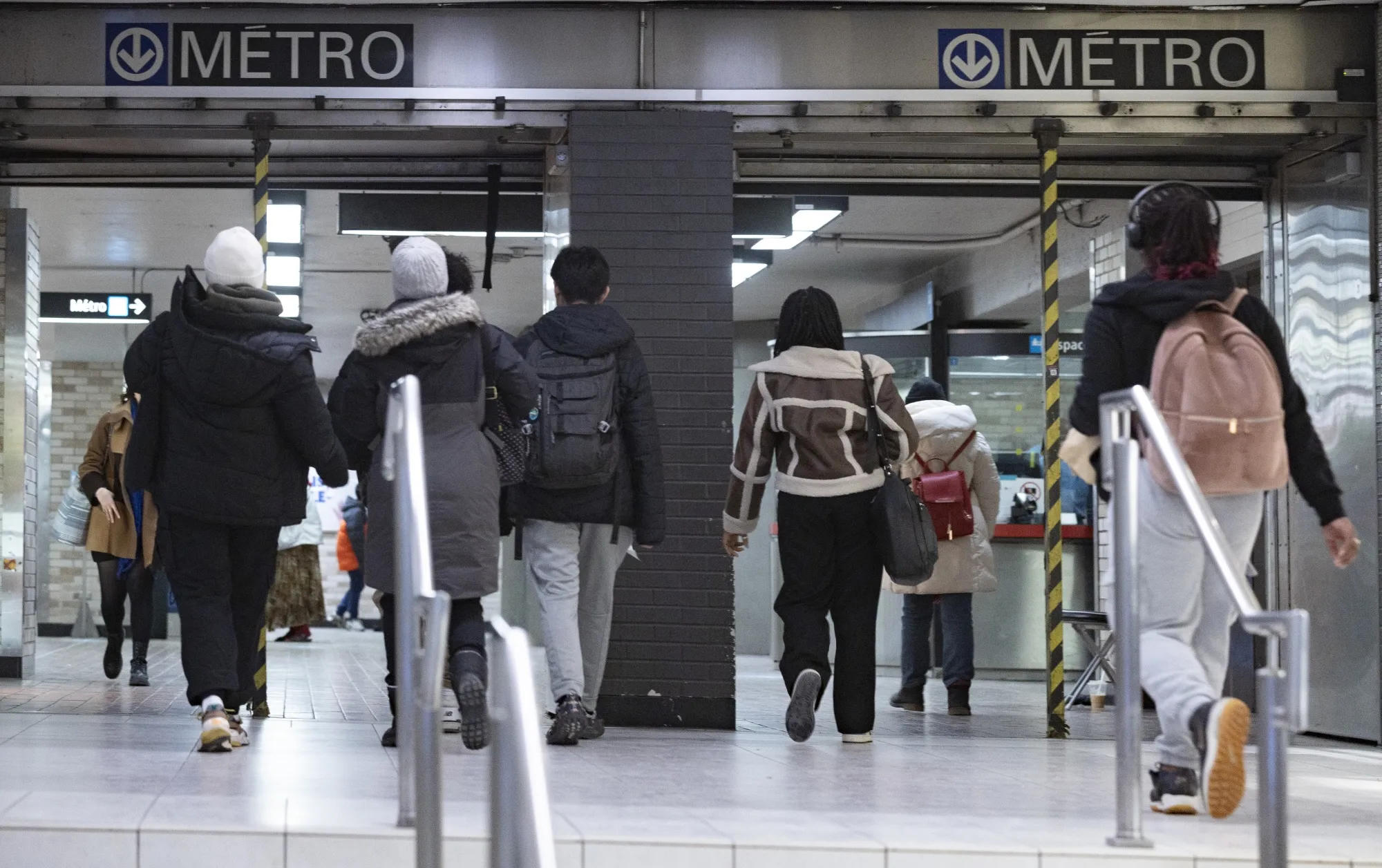 Commuters head into the metro in Montreal, Canada’s second-biggest city.