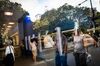 People use automated teller machines (ATM) as pedestrians are reflected on the window of a Citigroup Inc. bank branch in New York, U.S., on Wednesday, July 3, 2019. Citigroup Inc. is scheduled to release earnings figures on July 15.