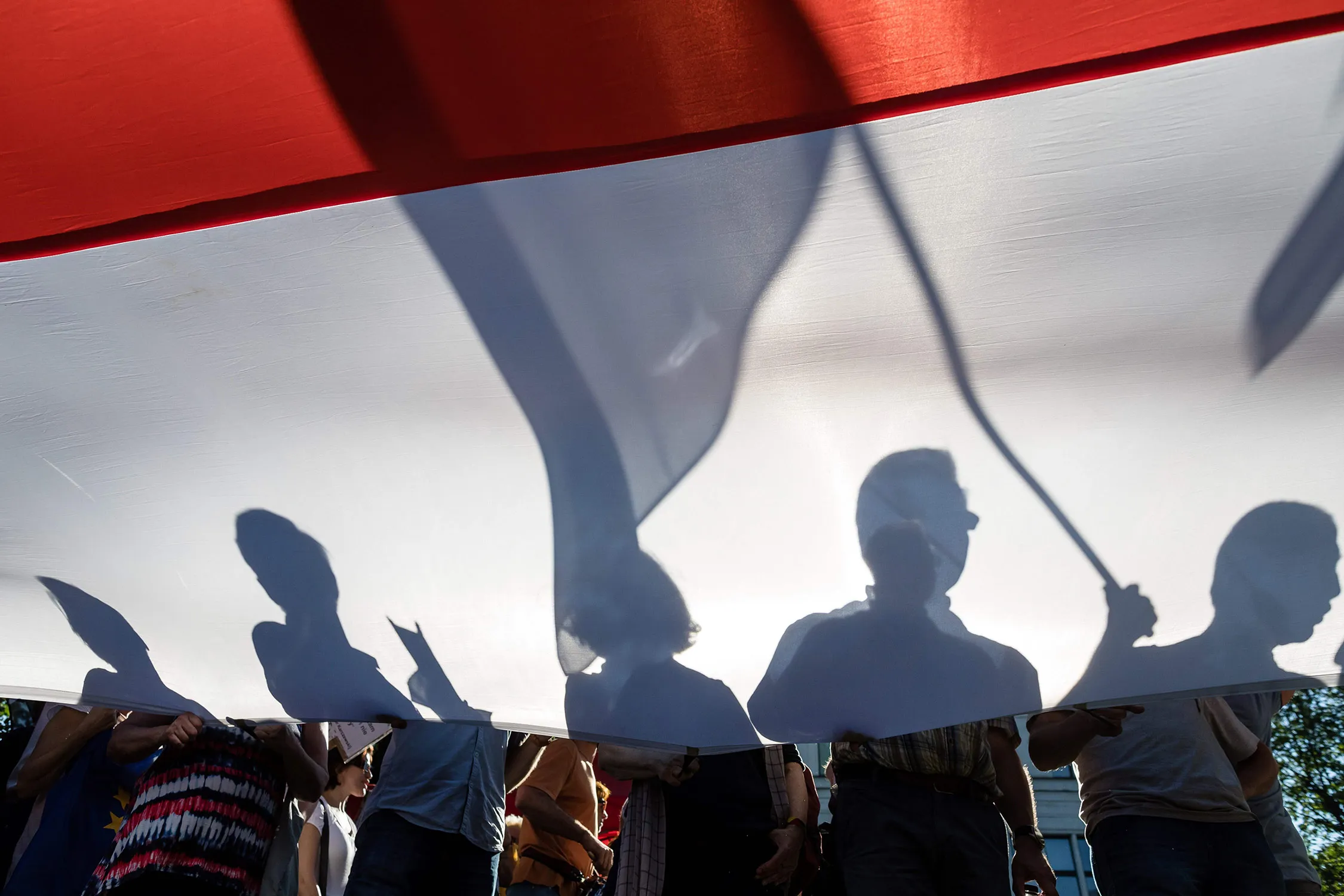 Poland’s national flag is unfurled during a demonstration against Polish government actions that impinge on the independence of the country’s judiciary system&nbsp;on July 24 in Warsaw.