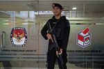 A&nbsp;police officer&nbsp;at the General Election Commission in Jakarta on May 15.