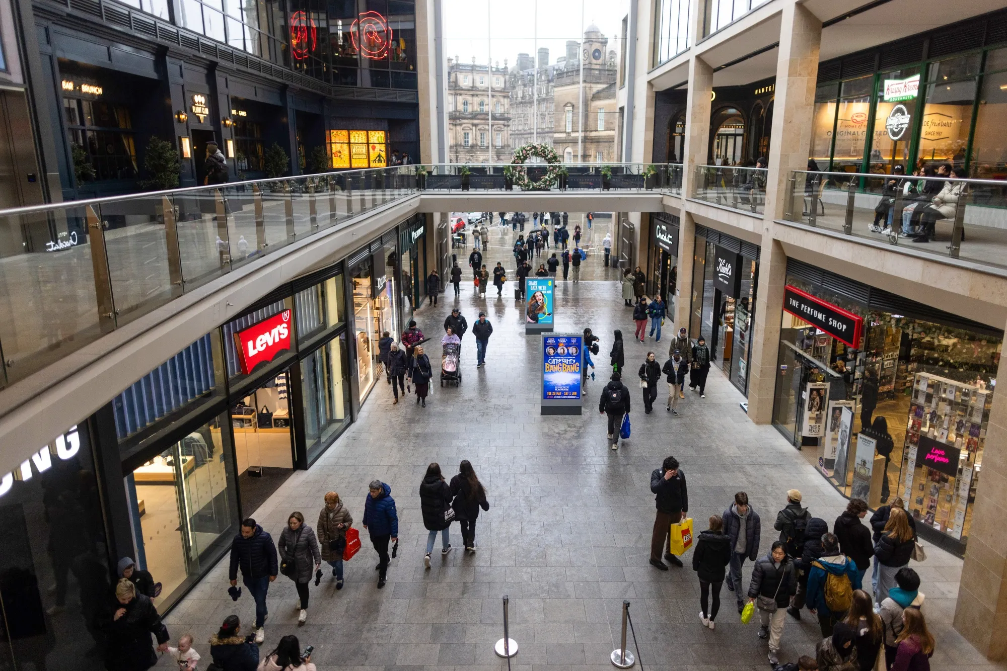 Shoppers pass through a shopping centre in Edinburgh, UK, on Wednesday, April 3, 2024. UK companies expect to raise their own prices by the least in almost 2 1/2 years, a further sign that an unwinding of inflationary pressures is gathering momentum.