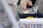 Grocery Shoppers As Japan Growth Outlook Cut Despite Better 4Q