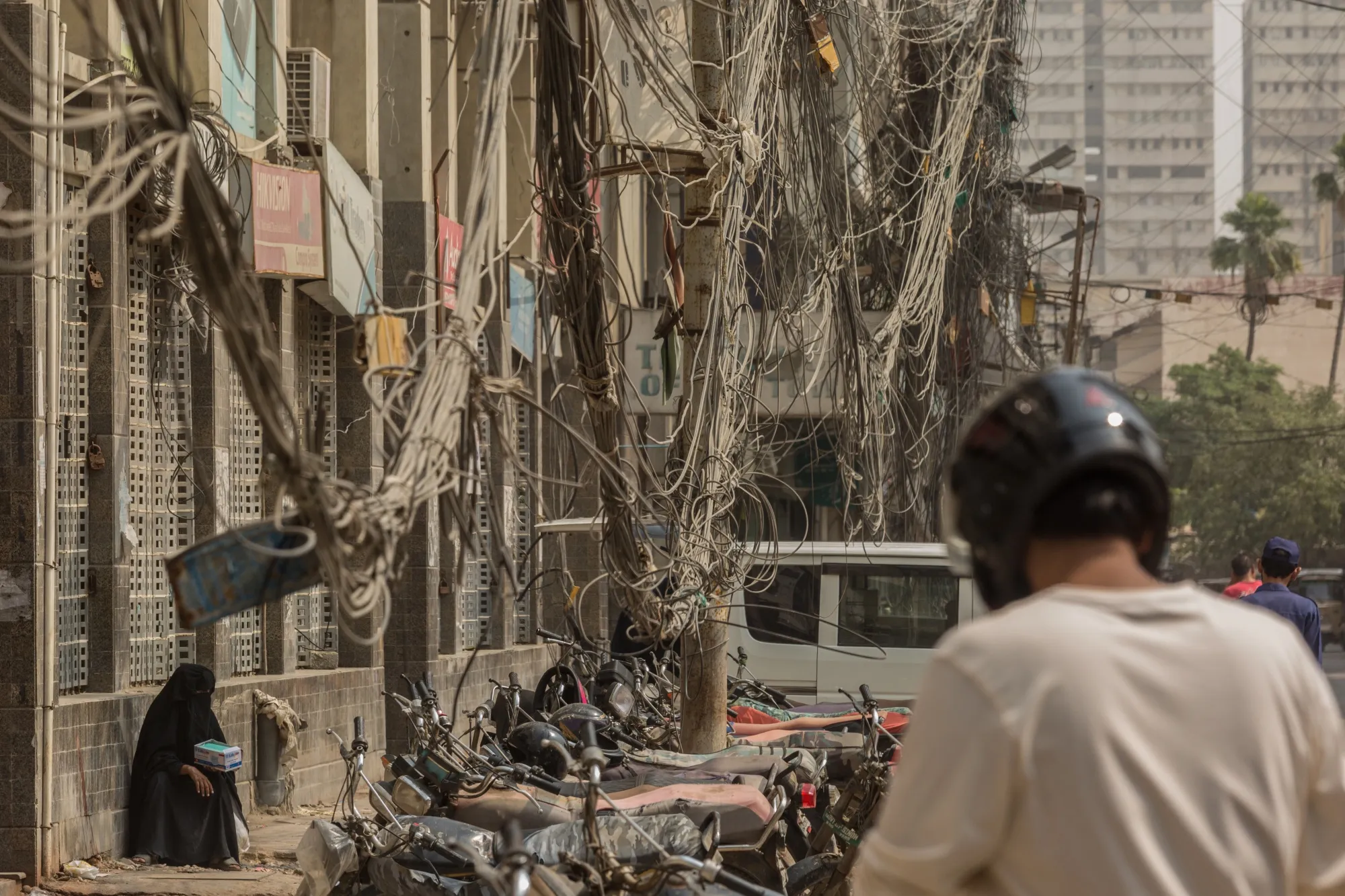 Electricity and telephone cables on I.I. Chundrigar Road in Karachi, Pakistan.