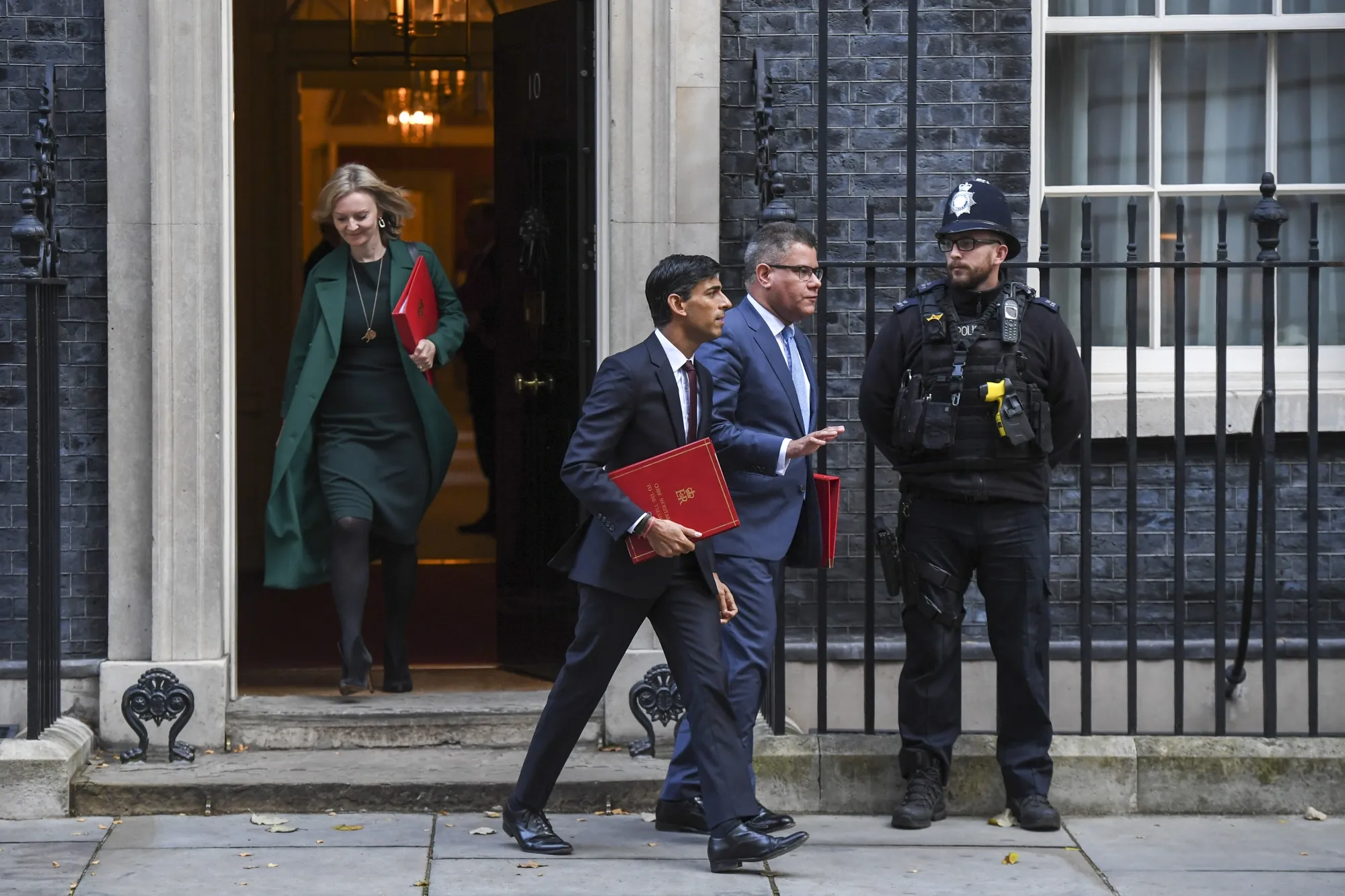 Liz Truss, left, and Rishi Sunak leaving 10 Downing Street after a cabinet meeting in 2019.