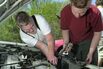 Kelly Brazil, left, works with Will Eaton, a freshman at the New School in Kennebunk, putting in a g