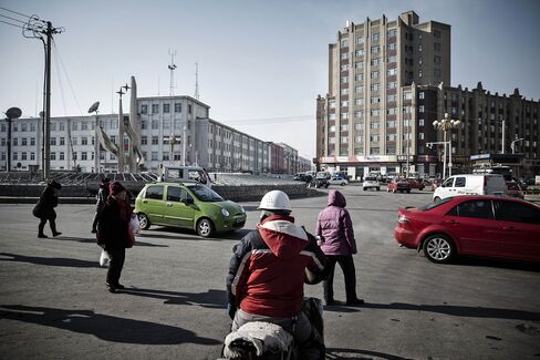 Traffic and pedestrians.