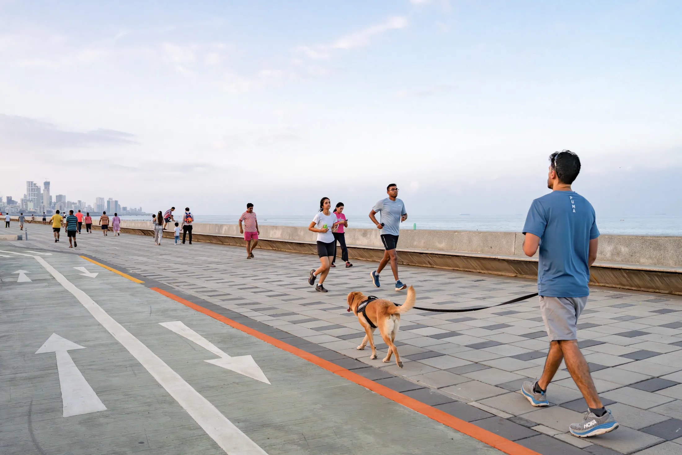 Pedestrians walk along Mumbai’s Coastal Road Promenade, in&nbsp;November. Reliance Foundation is set to make over the area currently known as the Coastal Road Promenade into the Coastal Road Garden.&nbsp;