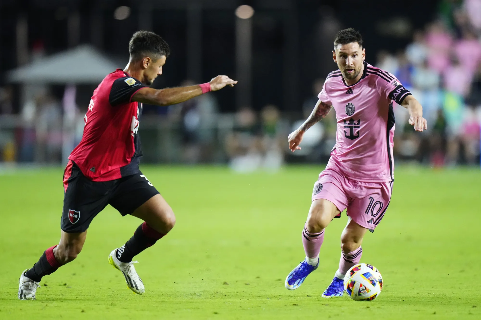 Lionel Messi dribbles the ball during a match in Fort Lauderdale, Florida.