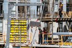 Workers on a condo building under construction in downtown Victoria, British Columbia, Canada, on Thursday, April 7.&nbsp;
