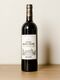 A bottle of 2012 Chateau Marqui d'Alesme.
