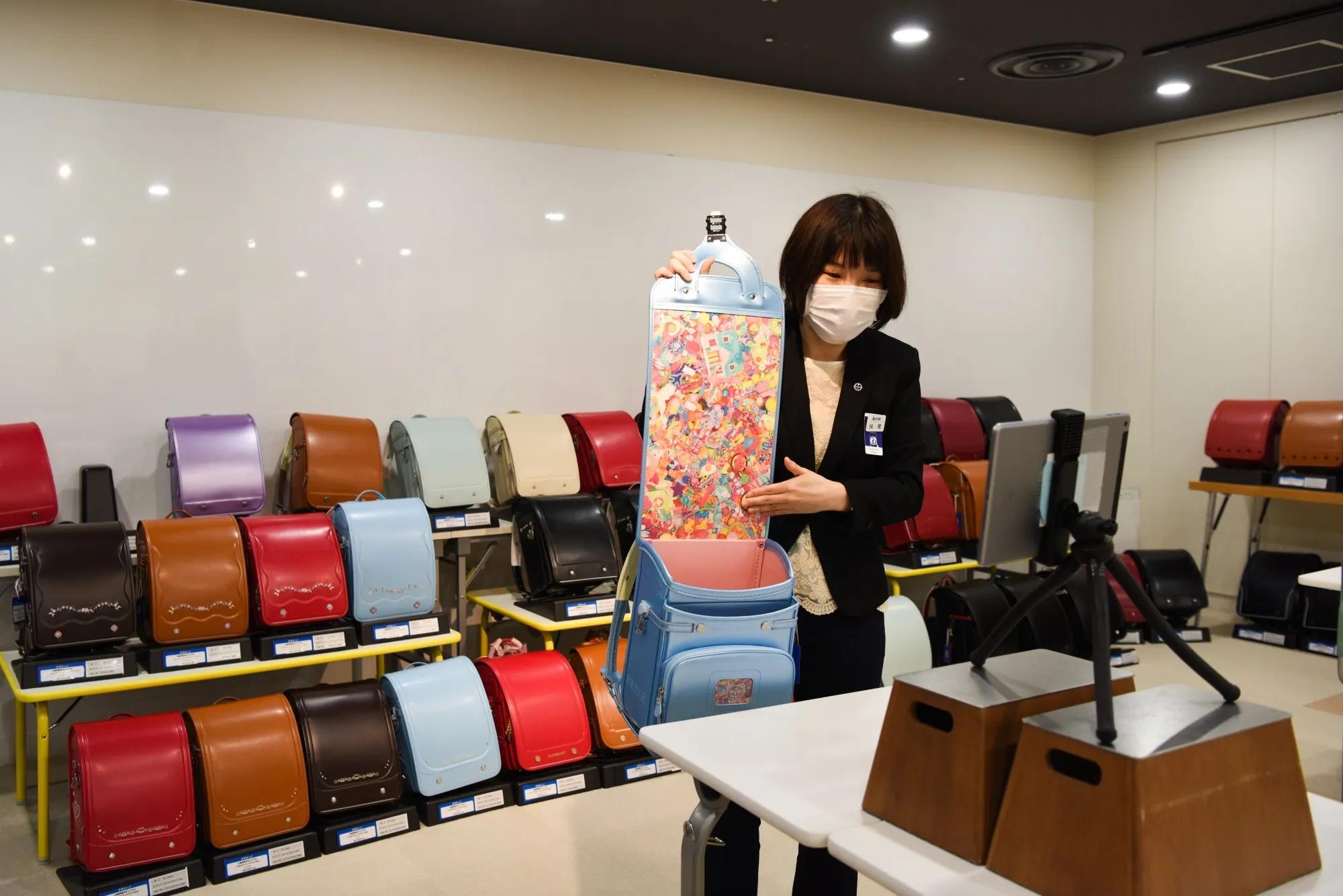 A sales clerk at the Isetan Shinjuku department store demonstrates online shopping service.