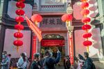 A storefront decorated is with a Chinese national flag and red lanterns to celebrate the National Day in Beijing on Oct. 4.