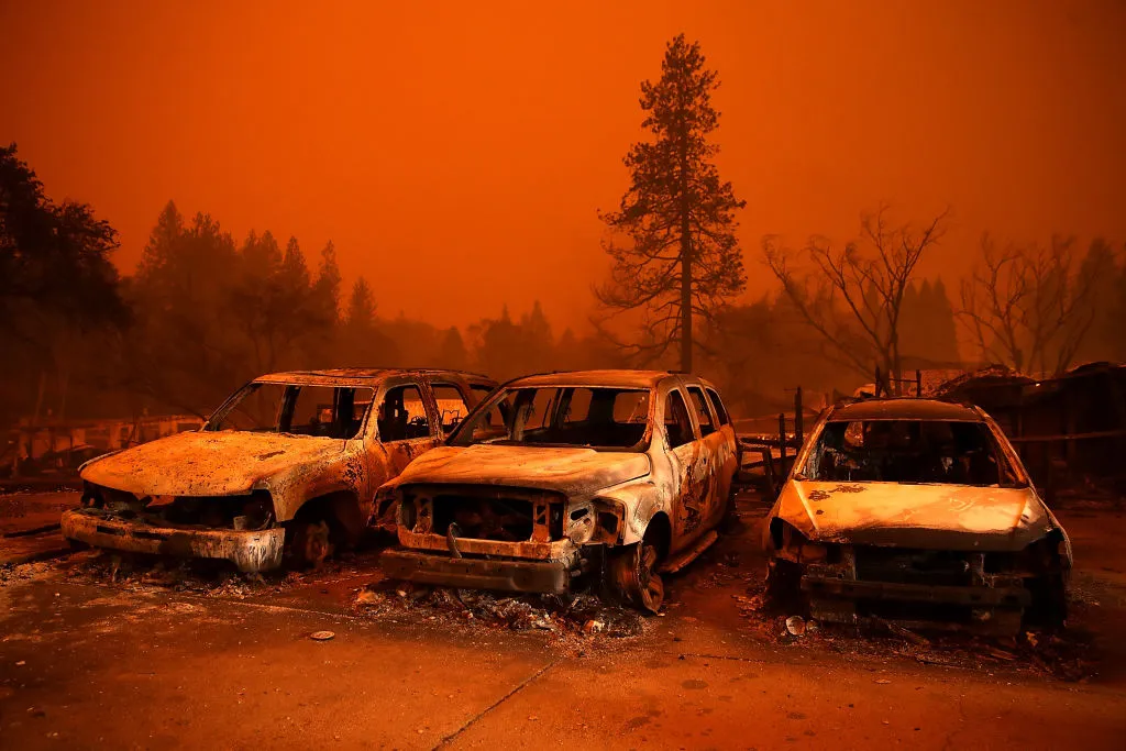 Cars destroyed by the Camp Fire sit in the lot at a used car dealership on November 9, 2018, in Paradise, California.