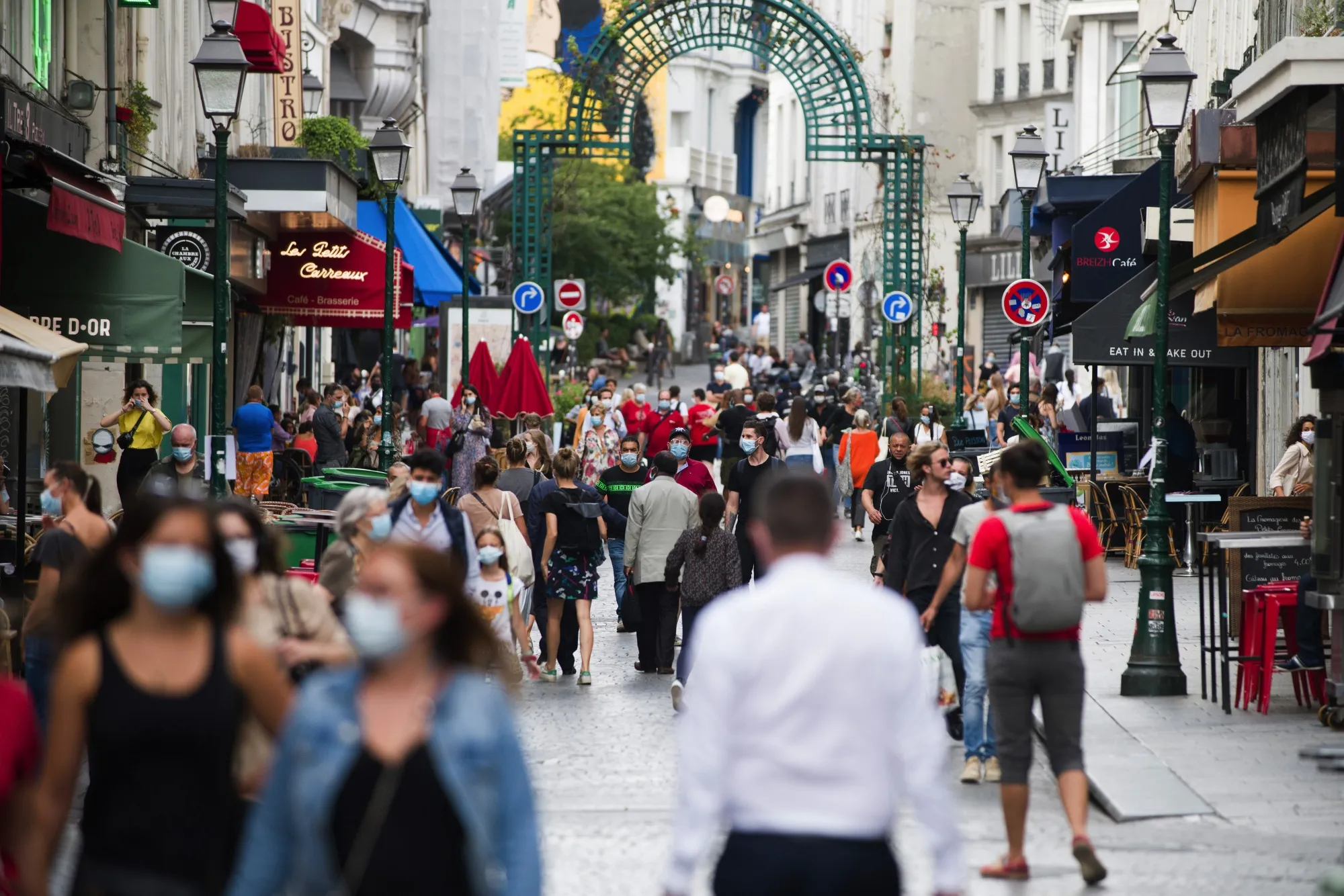 Cafes and retail stores on the Rue Montorgueil in Paris, France, on&nbsp;Aug. 26.