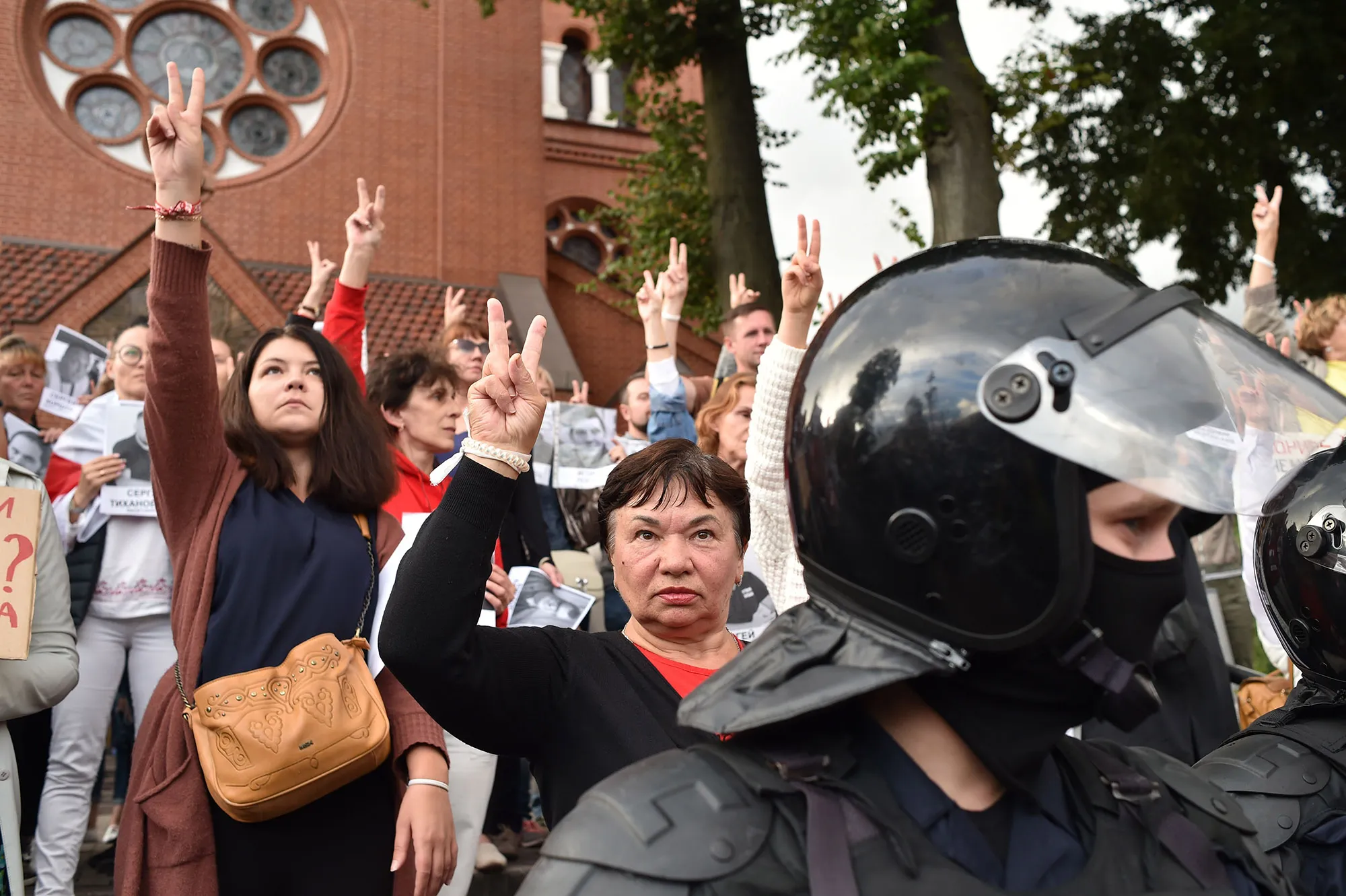 Belarus opposition supporters make Victory signs during their rally&nbsp;in Minsk on Aug.&nbsp;27.