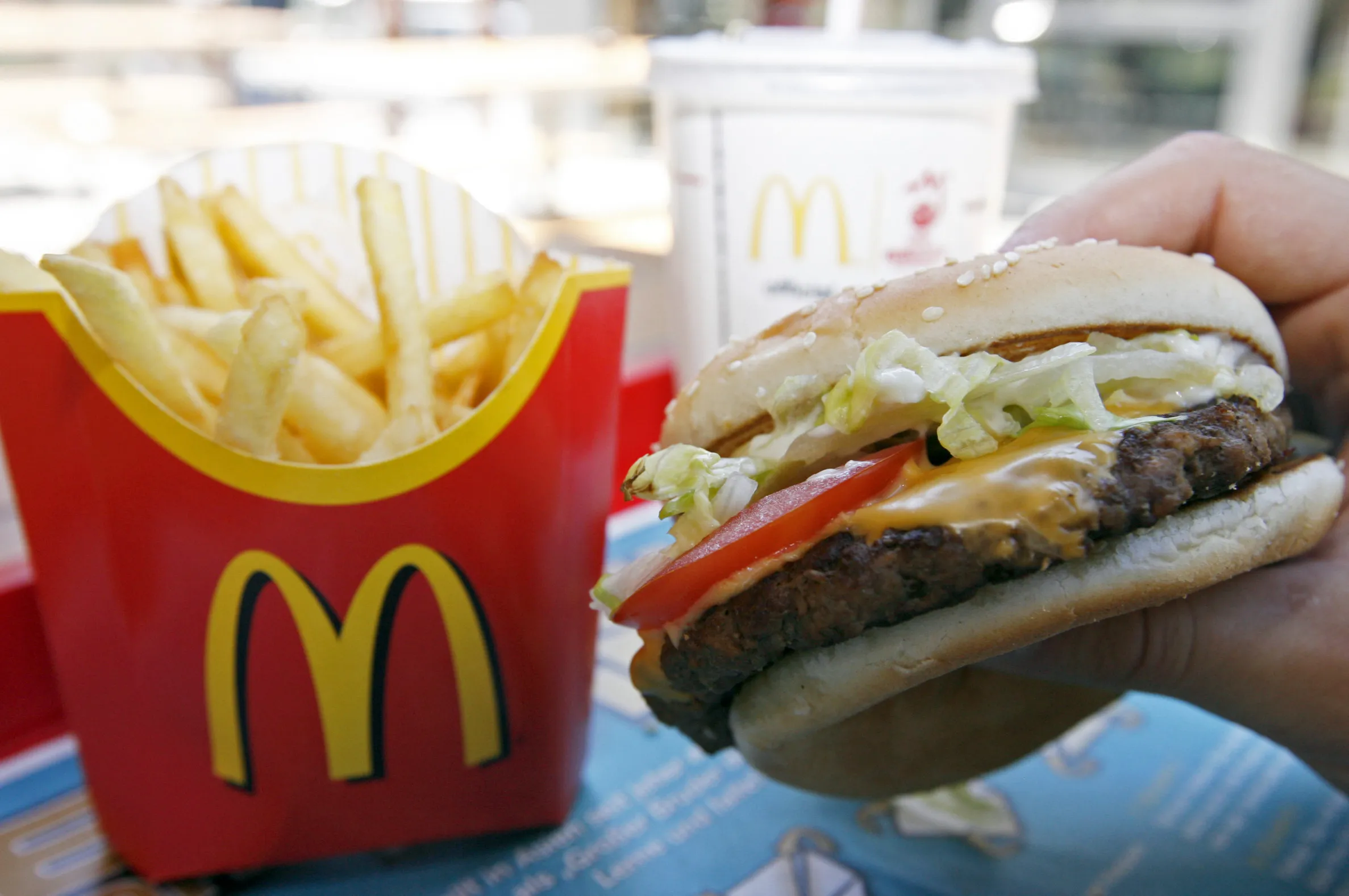 That burger will cost you 20% more in the UK.