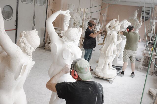 Working on statues by hand at Franco Cervietti.
