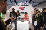Attendees look at the Google Inc. Stadia game controller at the Game Developers Conference in San Francisco, California.