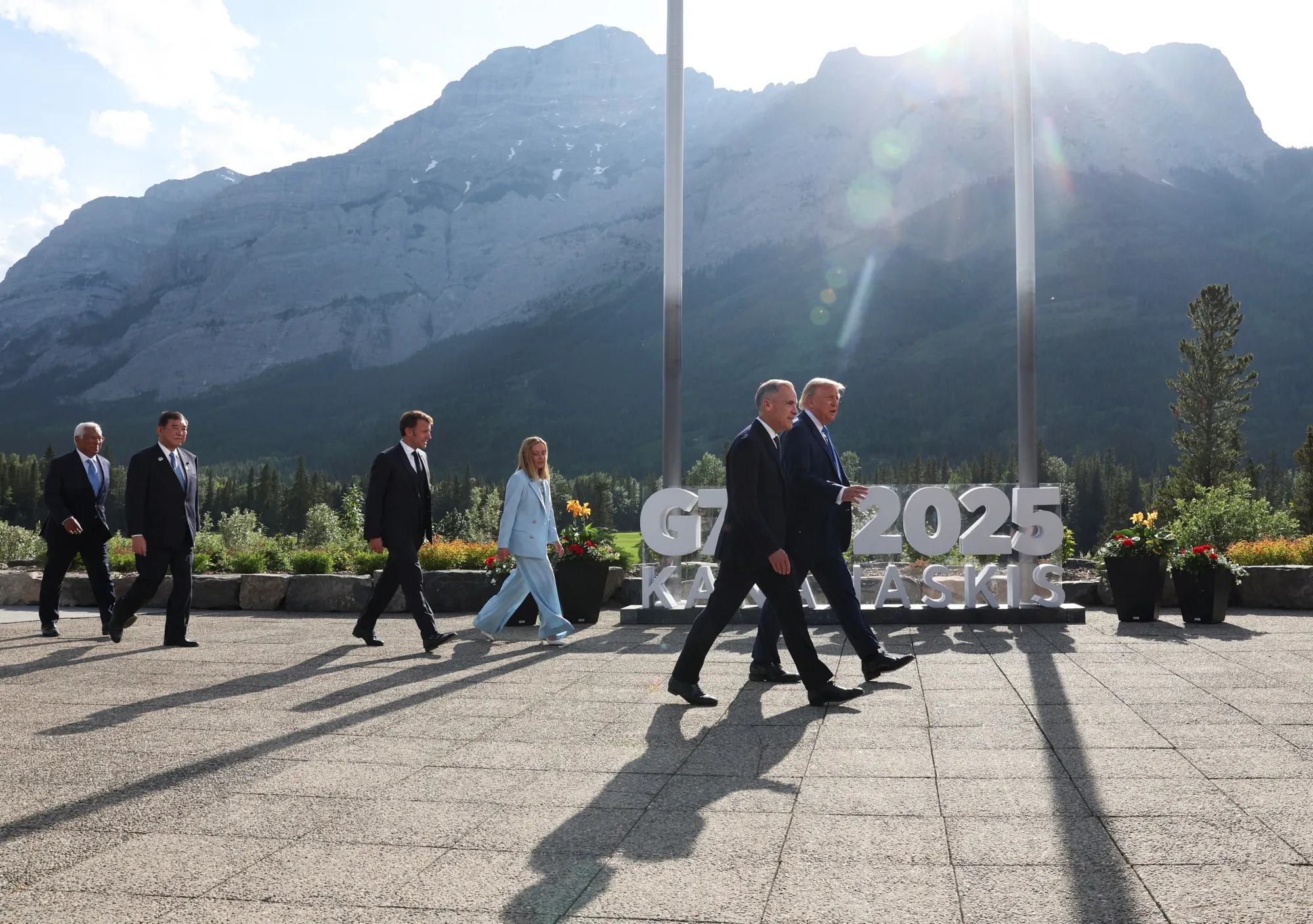 Donald Trump, from right, Mark Carney,&nbsp;Giorgia Meloni, Emmanuel Macron, Shigeru Ishiba and Antnio Costa depart after a family photo during the G-7 Summit in Kananaskis, Alberta, Canada, on June 16.