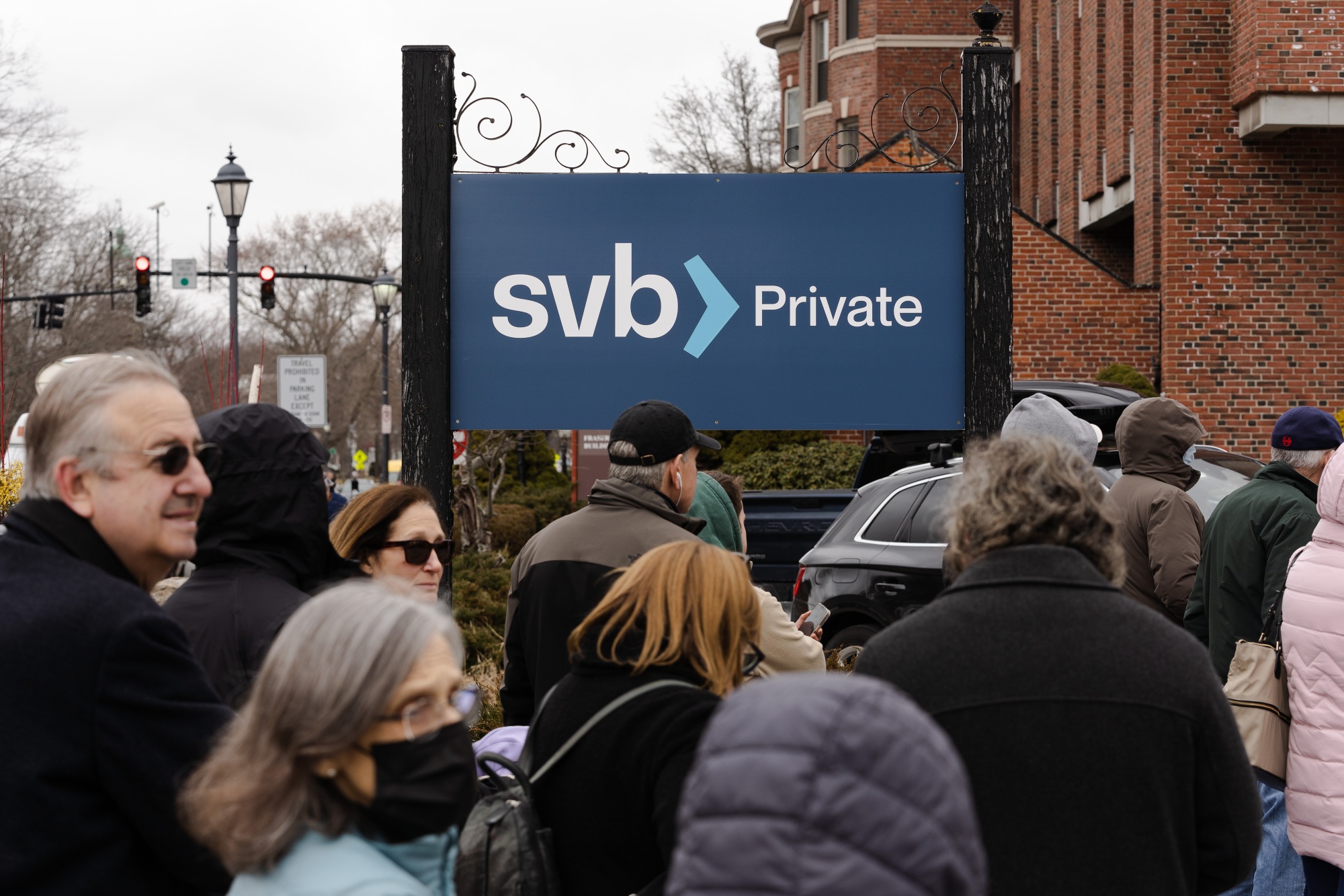 Customers outside of a Silicon Valley Bank branch in Wellesley, Massachusetts.
