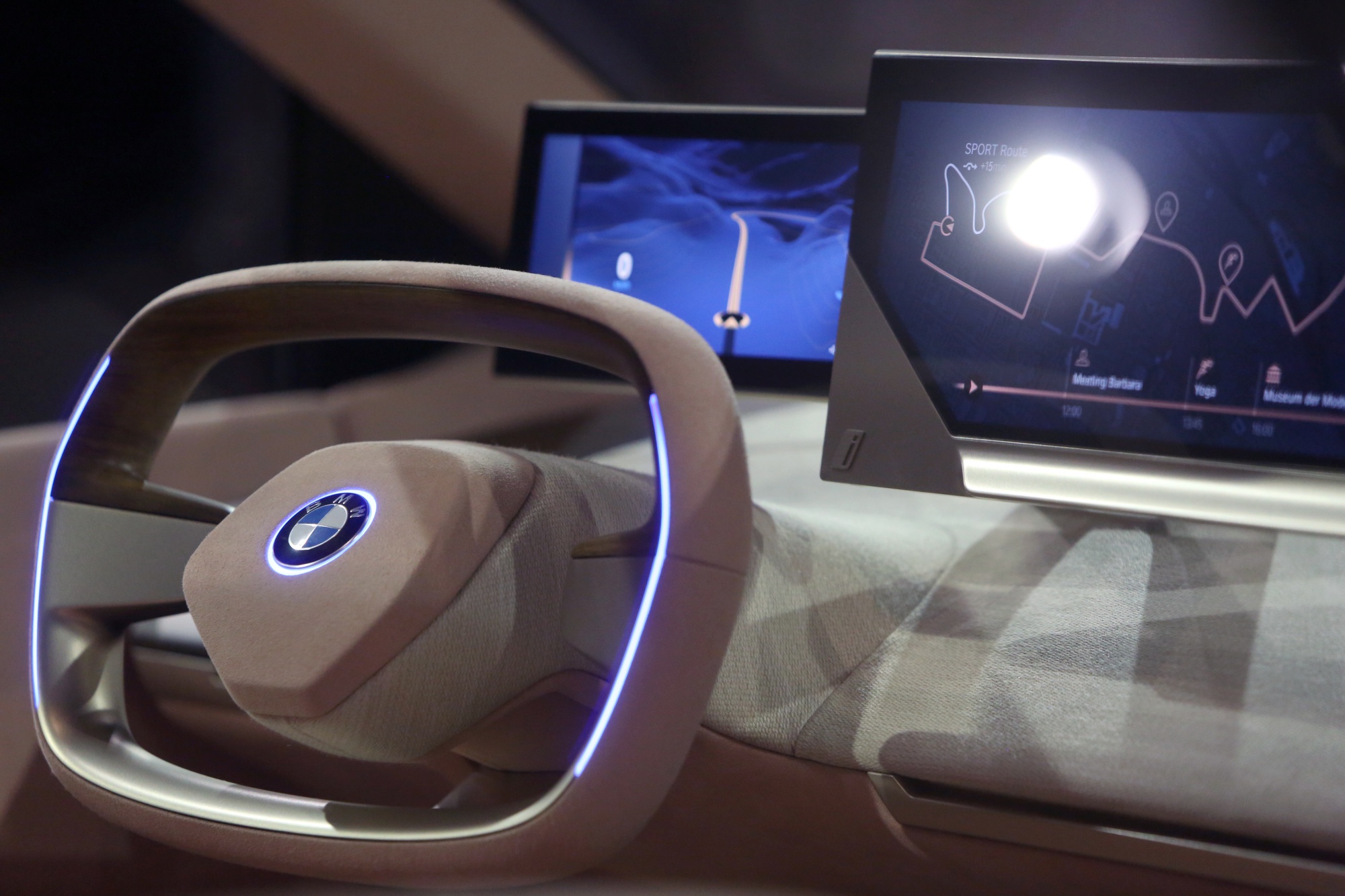 The steering wheel and digital dashboard of a BMW&nbsp;iNext concept electric sport utility vehicle.