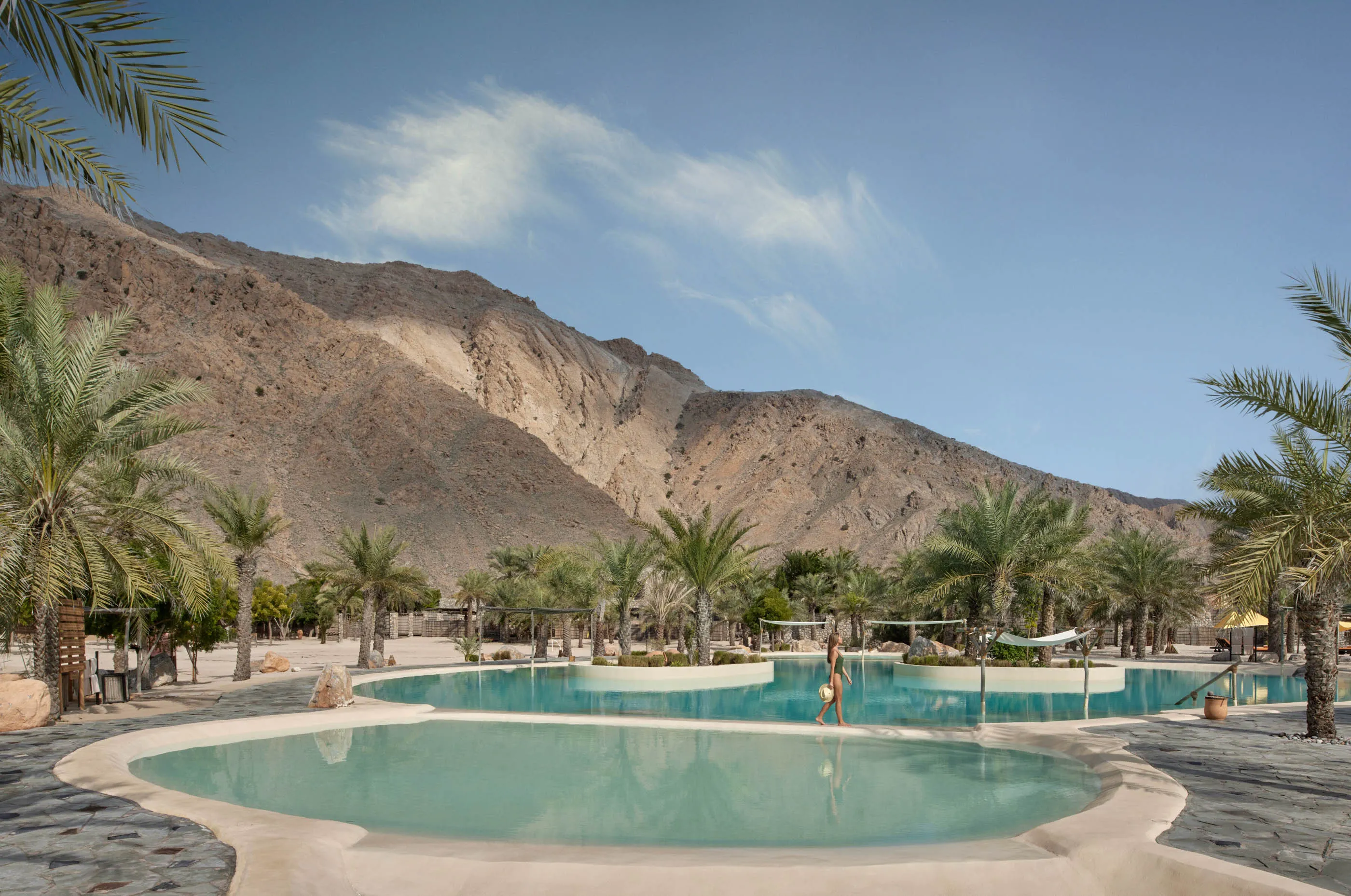 The pool at the Six Senses Zighy Bay, with mountains in the background.