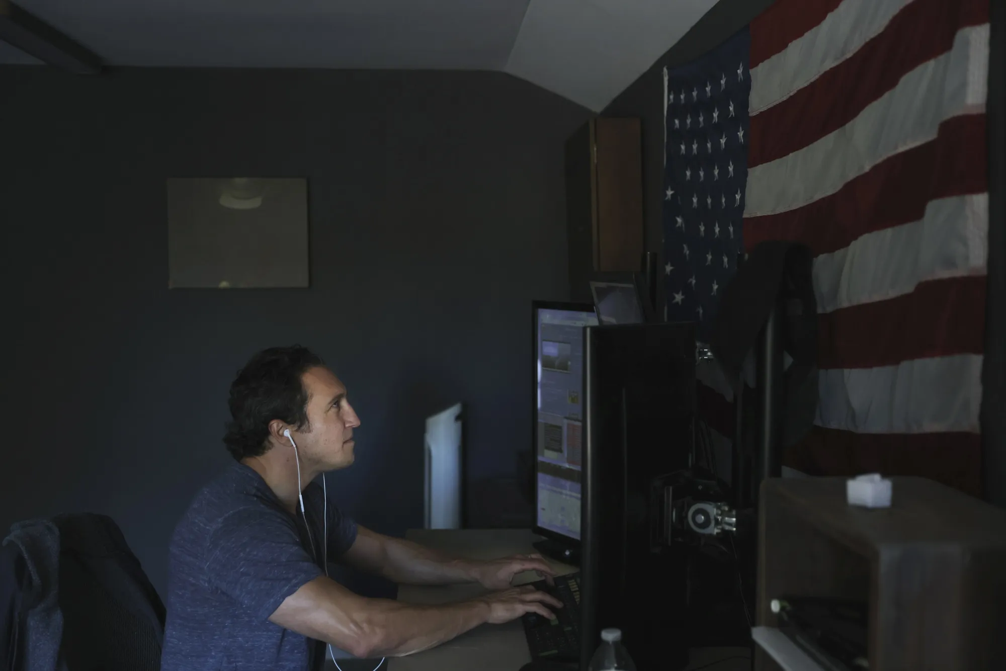 Rick Bandazian works as a trader from his office in Waxhaw, North Carolina on Nov. 5.