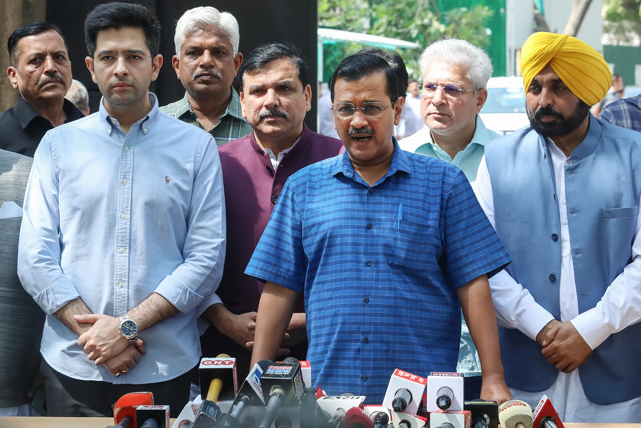 Arvind Kejriwal, center, addresses the media before appearing for questioning at the Central Bureau of Investigation (CBI) headquarters on April 16.