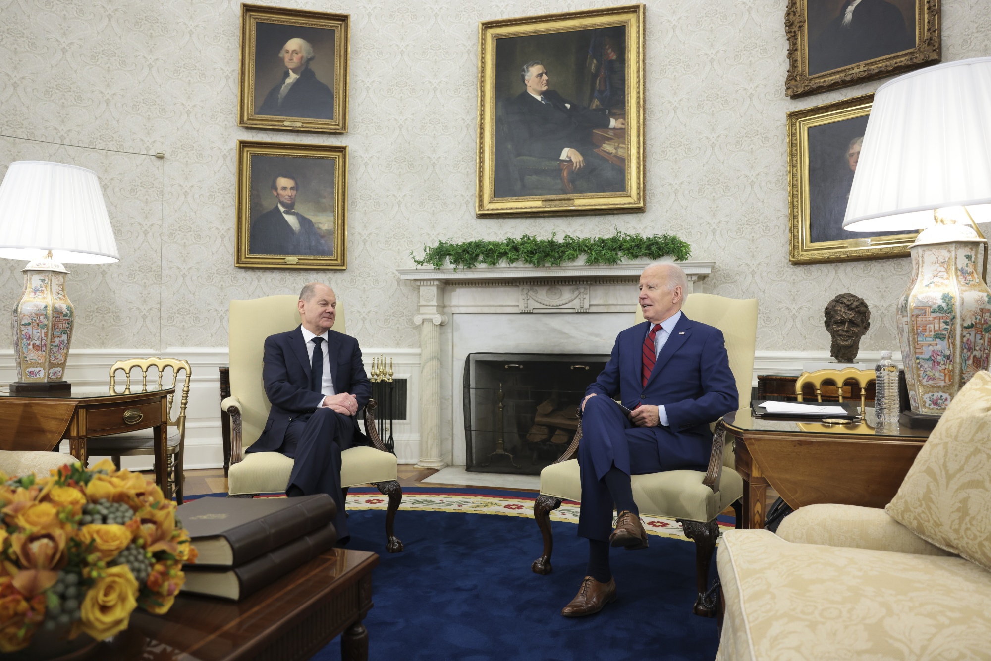 President Joe Biden speaks with Chancellor&nbsp;Olaf Scholz, left,&nbsp;during a meeting in the Oval Office, on March 3.