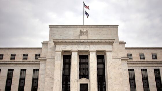 Fed Lifts Rates a Quarter Point and Signals More Hikes to Come