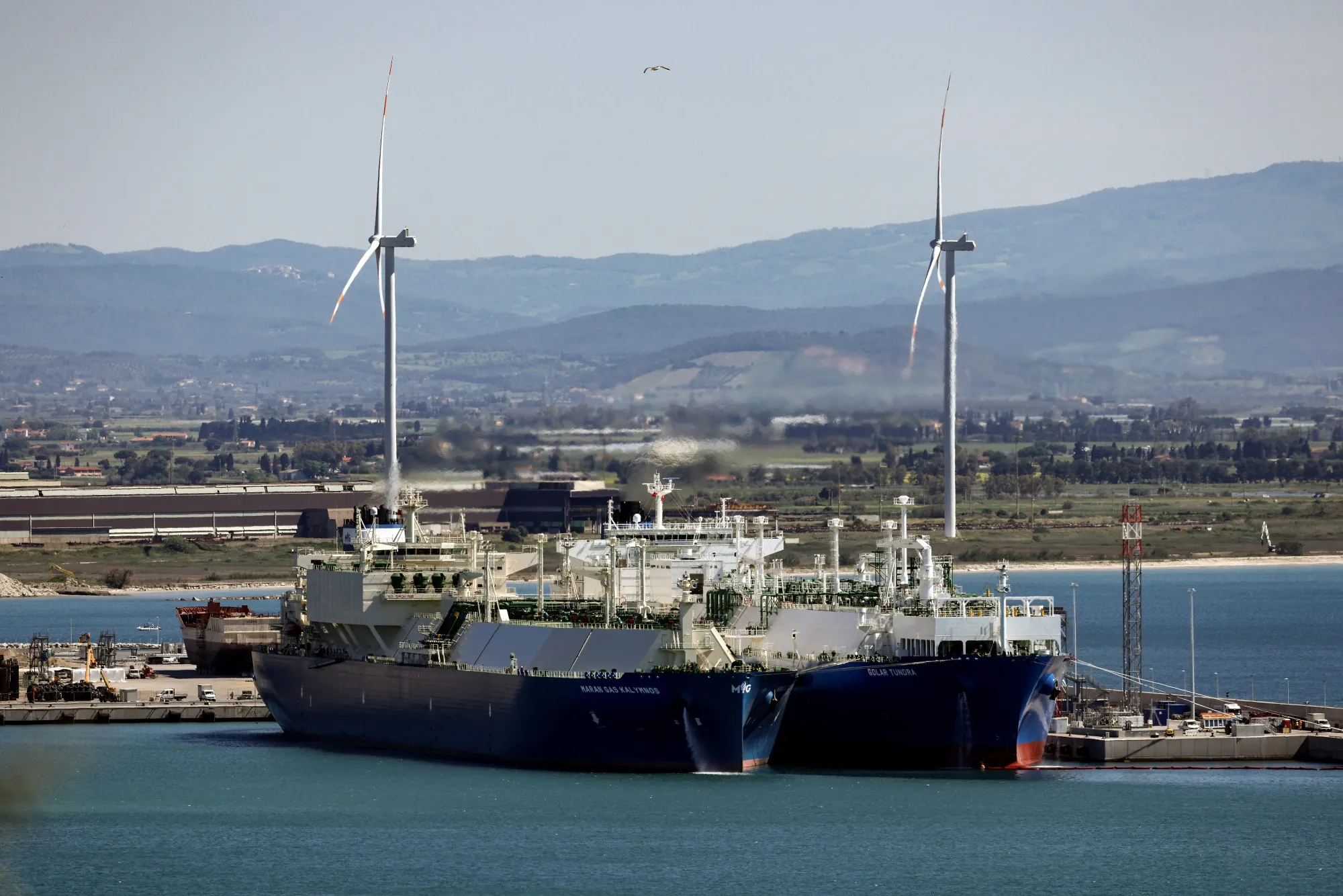 The Golar Tundra floating storage liquefied natural gas (LNG) regasification terminal vessel, right, in the port of Piombino, Italy.