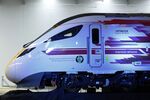 A Hitachi AT300 Class 800 series train sits on display at the opening of Hitachi Rail Europe Ltd.'s rail vehicle manufacturing facility.