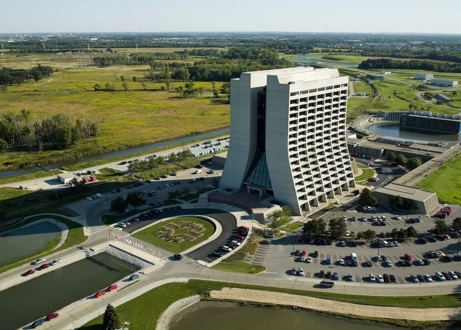 The Brutalist-style Wilson Building, named for former director Robert R. Wilson, was reportedly inspired by the Gothic cathedral in Beauvais, France. Other early buildings in the complex were much humbler.